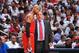 Taj Gibson conferences with Tom Thibodeau.