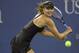 Aug 25, 2014; New York, NY, USA; Maria Sharapova (RUS) in action in her match against Maria Kirilenko (RUS) on day one of the 2014 U.S. Open tennis tournament at USTA Billie Jean King National Tennis Center. Mandatory Credit: Susan Mullane-USA TODAY Sports