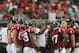 Atlanta Falcons special teams coach Keith Armstrong speaks to team members against the Cincinnati Bengals during an NFL football game at the Georgia Dome in Atlanta Sunday, Oct. 24, 2010. (AP Photo/John Bazemore)