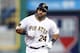 Aug 25, 2014; Pittsburgh, PA, USA; Pittsburgh Pirates first baseman Pedro Alvarez (24) rounds the bases after hitting a solo home run against the St. Louis Cardinals during the second inning at PNC Park. Mandatory Credit: Charles LeClaire-USA TODAY Sports