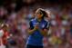 AS Monaco's Radamel Falcao applauds a teammate during the Emirates Cup soccer match between Arsenal and AS Monaco at Arsenal's Emirates Stadium, London, Sunday, Aug. 3, 2014. (AP Photo/Matt Dunham)