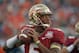 Florida State quarterback Jameis Winston (5) warms up before the NCAA BCS National Championship college football game against Auburn, Monday, Jan. 6, 2014, in Pasadena, Calif. (AP Photo/Mark J. Terrill)