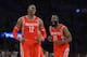 Houston Rockets center Dwight Howard, left, and guard James Harden reacts after Howard was called for a technical foul during the first half of an NBA basketball game against the Los Angeles Lakers, Wednesday, Feb. 19, 2014, in Los Angeles. (AP Photo/Mark J. Terrill)