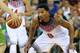 LAS PALMAS, GRAN CANARIA, SPAIN - AUGUST 26: Derrick Rose #6 of the USA Men's National Team defends the ball against the Slovenia National Team on August 26, 2014 at Gran Canaria Arena in Las Palmas, Gran Canaria, Spain. NOTE TO USER: User expressly acknowledges and agrees that, by downloading and or using this photograph, user is consenting to the terms and conditions of the Getty Images License Agreement. Mandatory Copyright Notice: Copyright 2014 NBAE (Photo by Joe Murphy/NBAE via Getty Images)