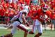 Sep 8, 2012; Clemson, SC, USA; Clemson Tigers wide receiver Charone Peake (19) carries the ball while being defended by Ball State Cardinals safety Jarrett Swaby (34) during the first quarter of the game at Memorial Stadium. Mandatory Credit: Joshua S. Kelly-USA TODAY Sports