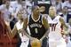 Brooklyn Nets center Andray Blatche (0) looks for an open teammate as he is guarded by Miami Heat guard Ray Allen, left, and forward Chris Andersen (11) during the first half of Game 2 of an Eastern Conference semifinal basketball game, Thursday, May 8, 2014 in Miami. (AP Photo/Wilfredo Lee)