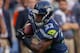 SEATTLE, WA - AUGUST 22: Running back Christine Michael #33 of the Seattle Seahawks rushes against the Chicago Bears at CenturyLink Field on August 22, 2014 in Seattle, Washington. (Photo by Otto Greule Jr/Getty Images)