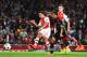 LONDON, ENGLAND - AUGUST 27: Alexis Sanchez (left) of Arsenal shoots and scores past Tolga Zengin the Besiktas goalkeeper during the UEFA Champions League Qualifier 2nd leg match between Arsenal and Besiktas at the Emirates Stadium on August 27, 2014 in London, United Kingdom. (Photo by Shaun Botterill/Getty Images)