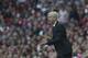 Arsenal's manager Arsene Wenger gives instructions from the sidelines during their English Premier League soccer match against Crystal Palace, at Emirates Stadium, in London, Saturday, Aug. 16, 2014. (AP Photo/Bogdan Maran)