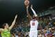 LAS PALMAS, GRAN CANARIA, SPAIN - AUGUST 26: Kyrie Irving #10 of the USA Basketball Men's National Team shoots against the Slovenia Basketball Men's National Team on August 26, 2014 at Gran Canaria Arena in Las Palmas, Gran Canaria, Spain. NOTE TO USER: User expressly acknowledges and agrees that, by downloading and or using this photograph, user is consenting to the terms and conditions of the Getty Images License Agreement. Mandatory Copyright Notice: Copyright 2014 NBAE (Photo by Joe Murphy/NBAE via Getty Images)