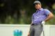 Rory McIlroy, of Northern Ireland, reacts to his tee shot on the fifth hole during second round play at The Barclays golf tournament Friday, Aug. 22, 2014, in Paramus, N.J. (AP Photo/Adam Hunger)