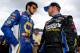 DAYTONA BEACH, FL - JULY 04: Chase Elliott (L), driver of the #9 Napa Auto Parts Chevrolet, talks to Regan Smith, driver of the #7 Goody's Chevrolet, on the grid during qualifying for the NASCAR Nationwide Series Subway Firecracker 250 at Daytona International Speedway on July 4, 2014 in Daytona Beach, Florida. (Photo by Jerry Markland/Getty Images)
