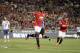 Manchester United's Danny Welbeck celebrates after scoring against the Los Angeles Galaxy during the first half of a friendly soccer match at Rose Bowl on Wednesday, July 23, 2014, in Pasadena, Calif. (AP Photo)