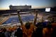 Fans cheer from the stands at Bronco Stadium during an NCAA college football game between Boise State and Nevada, Saturday, Oct. 19, 2013 in Boise, Idaho. (AP Photo/Ted S. Warren)