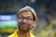 Dortmund's head coach Juergen Klopp smiles during the German soccer Super Cup match between Borussia Dortmund and Bayern Munich in Dortmund, Germany, Wednesday, Aug. 13, 2014. (AP Photo/Sascha Schuermann)