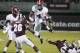 FILE -- In a Nov. 16, 2013, file photo Alabama running back T.J. Yeldon (4) leaps past an attempted tackle by Mississippi State defensive back Will Redmond, right, as defensive back Kendrick Market (26) closes in during the first quarter of an NCAA college football game in Starkville, Miss. Yeldon will likely become the face of the Crimson Tide and is expected to be a candidate for next season’s Heisman Trophy. (AP Photo/Rogelio V. Solis, file)