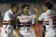 Paulo Henrique Ganso of Brazil's Sao Paulo FC, center, celebrates with teammates Lucas Evangelista, left, and Aloisio after scoring against Brazil's Ponte Preta at a Copa Sudamericana soccer match in Sao Paulo, Brazil, Wednesday, Nov. 20, 2013. (AP Photo/Andre Penner)