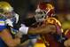 Southern California defensive end Leonard Williams, right, tries to get by UCLA guard Alex Redmond during the first half of an NCAA college football game, Saturday, Nov. 30, 2013, in Los Angeles. (AP Photo/Mark J. Terrill)