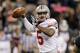FILE - In this Dec. 7, 2013, file photo, Ohio State quarterback Braxton Miller throws a pass against Michigan State during the Big Ten Conference championship NCAA college football game in Indianapolis. Despite missing nearly three full games with a sprained knee last season, he passed for 2,094 yards and 24 touchdowns, and ran for 1,068 yards and 12 scores. (AP Photo/Michael Conroy, File)