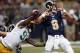 Green Bay Packers linebacker Jayrone Elliott, left, knocks the ball out of the hand of St. Louis Rams quarterback Austin Davis during the fourth quarter of an NFL preseason football game Saturday, Aug. 16, 2014, in St. Louis. Davis recovered the ball but the Packers went on to win 21-7. (AP Photo/Scott Kane)