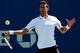 NEW YORK, NY - AUGUST 28: Novak Djokovic of Serbia returns a shot against Paul-Henri Mathieu of France during their men's second round match on Day Four of the 2014 US Open at the USTA Billie Jean King National Tennis Center on August 28, 2014 in the Flushing neighborhood of the Queens borough of New York City. (Photo by Elsa/Getty Images)