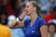 Petra Kvitova, of the Czech Republic, blows kisses to the crowd after defeating Petra Cetkovska, of the Czech Republic, during the second round of the 2014 U.S. Open tennis tournament, Thursday, Aug. 28, 2014, in New York. (AP Photo/Matt Rourke)