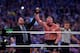 Paul Heyman, left, celebrates with Brock Lesnar after his win over the Undertaker during Wrestlemania XXX at the Mercedes-Benz Super Dome in New Orleans on Sunday, April 6, 2014. (Jonathan Bachman/AP Images for WWE)