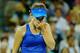 NEW YORK, NY - AUGUST 28: Catherine 'CiCi' Bellis of the United States reacts against Zarina Diyas of Kazakhstan during their women's singles second round match on Day Four of the 2014 US Open at the USTA Billie Jean King National Tennis Center on August 28, 2014 in the Flushing neighborhood of the Queens borough of New York City. (Photo by Chris Trotman/Getty Images for USTA)