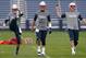 Left to right: Jimmy Garoppolo, Tom Brady and Ryan Mallett all get ready for Patriots practice.
