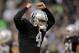 OAKLAND, CA - AUGUST 28: Quarterback Derek Carr #4 of the Oakland Raiders celebrates after a touchdown against the Seattle Seahawks during a preseason game at O.co Coliseum on August 28, 2014 in Oakland, California. (Photo by Ezra Shaw/Getty Images)