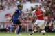 AS Monaco's Radamel Falcao, left, battles for the ball with Aresnal's debutant Mathieu Debuchy during the Emirates Cup soccer match between Arsenal and AS Monaco at Arsenal's Emirates Stadium in London, Sunday, Aug. 3, 2014. (AP Photo/Matt Dunham)