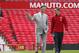 Manchester United's new player Angel Di Maria, right, and manager Louis van Gaal, pose for photographers, at Old Trafford Stadium in Manchester, England, Thursday, Aug. 28, 2014. Manchester United have signed winger Angel Di Maria from Real Madrid for a British record transfer fee of £59.7m. The Argentine winger had a medical in Manchester on Tuesday and has signed a five-year deal. (AP Photo/Alastair Grant)