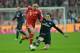 Bayern's Franck Ribery of France, left, and Hamburg's Milan Badelj challenge for the ball during the German first division Bundesliga soccer match between FC Bayern Munich and Hamburger SV in Munich, Germany, Saturday, Dec. 14, 2013. (AP Photo/Kerstin Joensson)