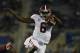 Oct 12, 2013; Lexington, KY, USA; Alabama Crimson Tide quarterback Blake Sims (6) leaps over Kentucky Wildcats cornerback Rodney Cox (21) during the game at Commonwealth Stadium. Alabama defeated Kentucky 48-7. Mandatory Credit: Mark Zerof-USA TODAY Sports