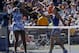 Venus Williams, of the United States, left, greets Sara Errani, of Italy, at the net after Errani won their third round match of the 2014 U.S. Open tennis tournament, Friday, Aug. 29, 2014, in New York. (AP Photo/Matt Rourke)