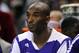 Dec 14, 2013; Charlotte, NC, USA; Los Angeles Lakers guard Kobe Bryant (24) watches his team from the bench during the first half of the game against the Los Angeles Lakers at Time Warner Cable Arena. Mandatory Credit: Sam Sharpe-USA TODAY Sports