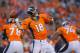 DENVER, CO - AUGUST 23: Quarterback Peyton Manning #18 of the Denver Broncos throws against the Houston Texans during a preseason game at Sports Authority Field at Mile High on August 23, 2014 in Denver, Colorado. (Photo by Justin Edmonds/Getty Images)