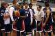United States basketball national team head coach Mike Krzyzewski, third from right, from talks to players during practice at Christl Arena at the U.S. Military Academy on Monday, Aug. 18, 2014, in West Point, N.Y. (AP Photo/Mike Groll)