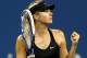 NEW YORK, NY - AUGUST 29: Maria Sharapova of Russia celebrates match point against Sabine Lisicki of Germany in the second set during their women's singles second round match on Day Five of the 2014 US Open at the USTA Billie Jean King National Tennis Center on August 29, 2014 in the Flushing neighborhood of the Queens borough of New York City. (Photo by Elsa/Getty Images)