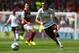 BURNLEY, ENGLAND - AUGUST 30: Angel di Maria of Manchester United runs with the ball during the Barclays Premier League match between Burnley and Manchester United at Turf Moor on August 30, 2014 in Burnley, England. (Photo by Clive Brunskill/Getty Images)