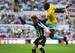 NEWCASTLE UPON TYNE, ENGLAND - AUGUST 30: Yannick Bolasie of Crystal Palace and Jack Colback of Newcastle United compete for the ball during the Barclays Premier League match between Newcastle United and Crystal Palace at St James' Park on August 30, 2014 in Newcastle upon Tyne, England. (Photo by Tony Marshall/Getty Images)