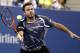 Stan Wawrinka, of Switzerland, returns a shot to Thomaz Bellucci, of Brazil, during the second round of the U.S. Open tennis tournament Wednesday, Aug. 27, 2014, in New York. (AP Photo/Jason DeCrow)