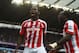 MANCHESTER, ENGLAND - AUGUST 30: Mame Biram Diouf (L) of Stoke City celebrates scoring the opening goal during the Barclays Premier League match between Manchester City and Stoke City at Etihad Stadium on August 30, 2014 in Manchester, England. (Photo by Shaun Botterill/Getty Images)