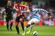 LONDON, ENGLAND - AUGUST 30: Leroy Fer of QPR holds off Jack Rodwell of Sunderland during the Barclays Premier League match between Queens Park Rangers and Sunderland at Loftus Road on August 30, 2014 in London, England. (Photo by Paul Gilham/Getty Images)