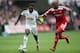 SWANSEA, WALES - AUGUST 30: Nathan Dyer of Swansea battles with Youssouf Mulumbu of West Brom during the Barclays Premier League match between Swansea City and West Bromwich Albion at Liberty Stadium on August 30, 2014 in Swansea, Wales. (Photo by Christopher Lee/Getty Images)