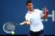 NEW YORK, NY - AUGUST 30: Novak Djokovic of Serbia returns a shot against Sam Querrey of the United States during their men's singles third round match on Day Six of the 2014 US Open at the USTA Billie Jean King National Tennis Center on August 30, 2014 in the Flushing neighborhood of the Queens borough of New York City. (Photo by Streeter Lecka/Getty Images)