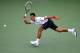 NEW YORK, NY - AUGUST 30: Novak Djokovic of Serbia returns a shot against Sam Querrey of the United States during their men's singles third round match on Day Six of the 2014 US Open at the USTA Billie Jean King National Tennis Center on August 30, 2014 in the Flushing neighborhood of the Queens borough of New York City. (Photo by Streeter Lecka/Getty Images)