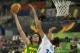 Brazil's Anderson França Vareja, left, shoots over France's Rudy Gobert, right, during the Group A Basketball World Cup match between Brazil and France in Granada, Spain, Saturday, Aug. 30, 2014. The 2014 Basketball World Cup competition will take place in various cities in Spain from Aug. 30 through to Sept. 14. (AP Photo/Daniel Tejedor)