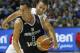 Argentina's Pablo Priogini, front, vies with Puerto Rico's Jose Barea, behind, during the Group B Basketball World Cup match between Argentina and Puerto Rico in Seville, Spain, Saturday, Aug. 30, 2014. The 2014 Basketball World Cup competition will take place in various cities in Spain from Aug. 30 through to Sept. 14. (AP Photo/Miguel Angel Morenatti)