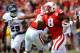 LINCOLN, NE - AUGUST 30: Running back Ameer Abdullah #8 of the Nebraska Cornhuskers runs for a first down past defensive back D'Joun Smith #21 and defensive back Sharrod Neasman #29 of the Florida Atlantic Owls during their game at Memorial Stadium on August 30, 2014 in Lincoln, Nebraska. (Photo by Eric Francis/Getty Images)